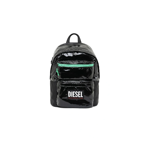 A black backpack with diesel logo on it.