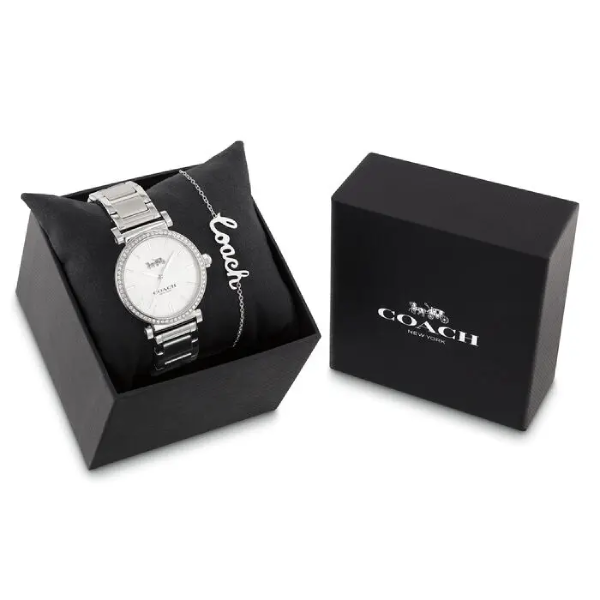 A coach watch in its box and packaging.