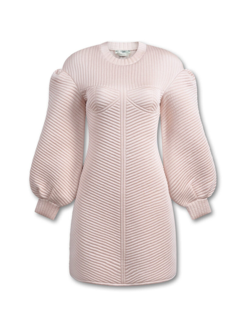 A light pink dress with long sleeves and a round neck.