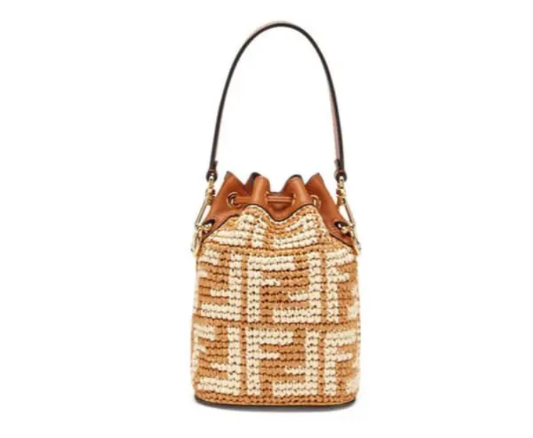 A brown and white bag is on the ground
