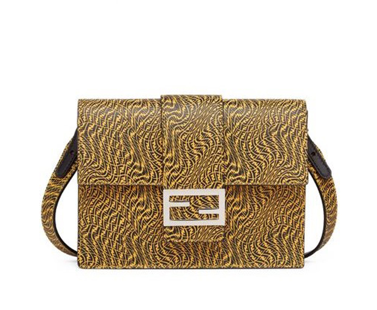 A brown and black zebra print bag with a strap.