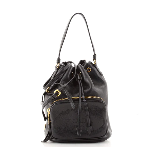 A black leather bag with two different bags on the front.