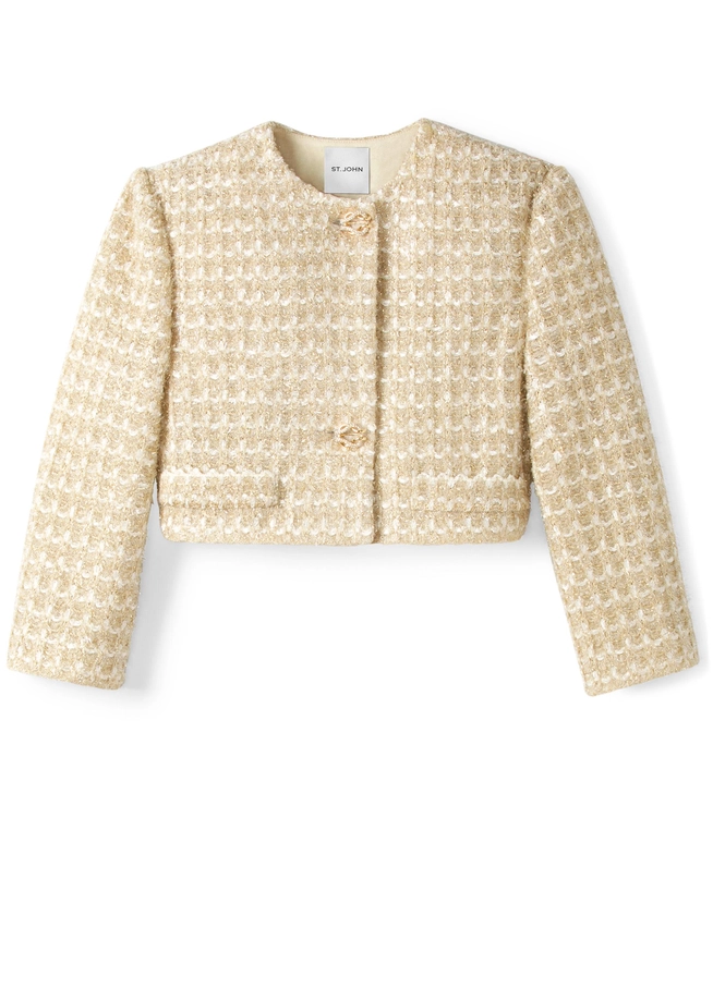 A beige jacket with white squares on it.