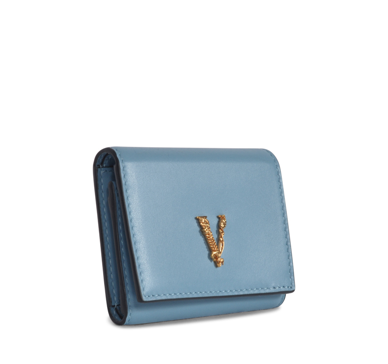 A blue wallet with the letter v on it.