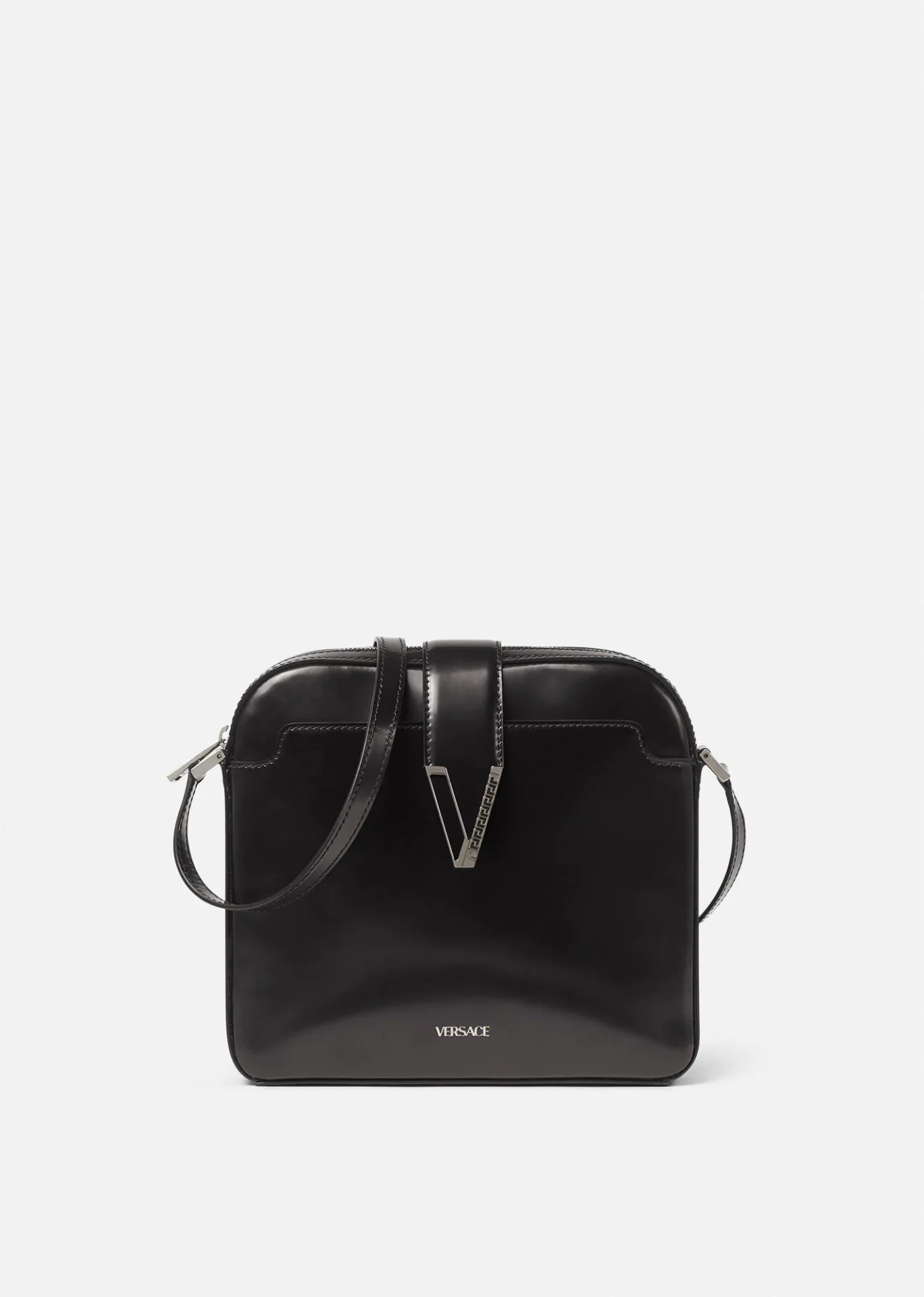 A black bag with a silver v on it.