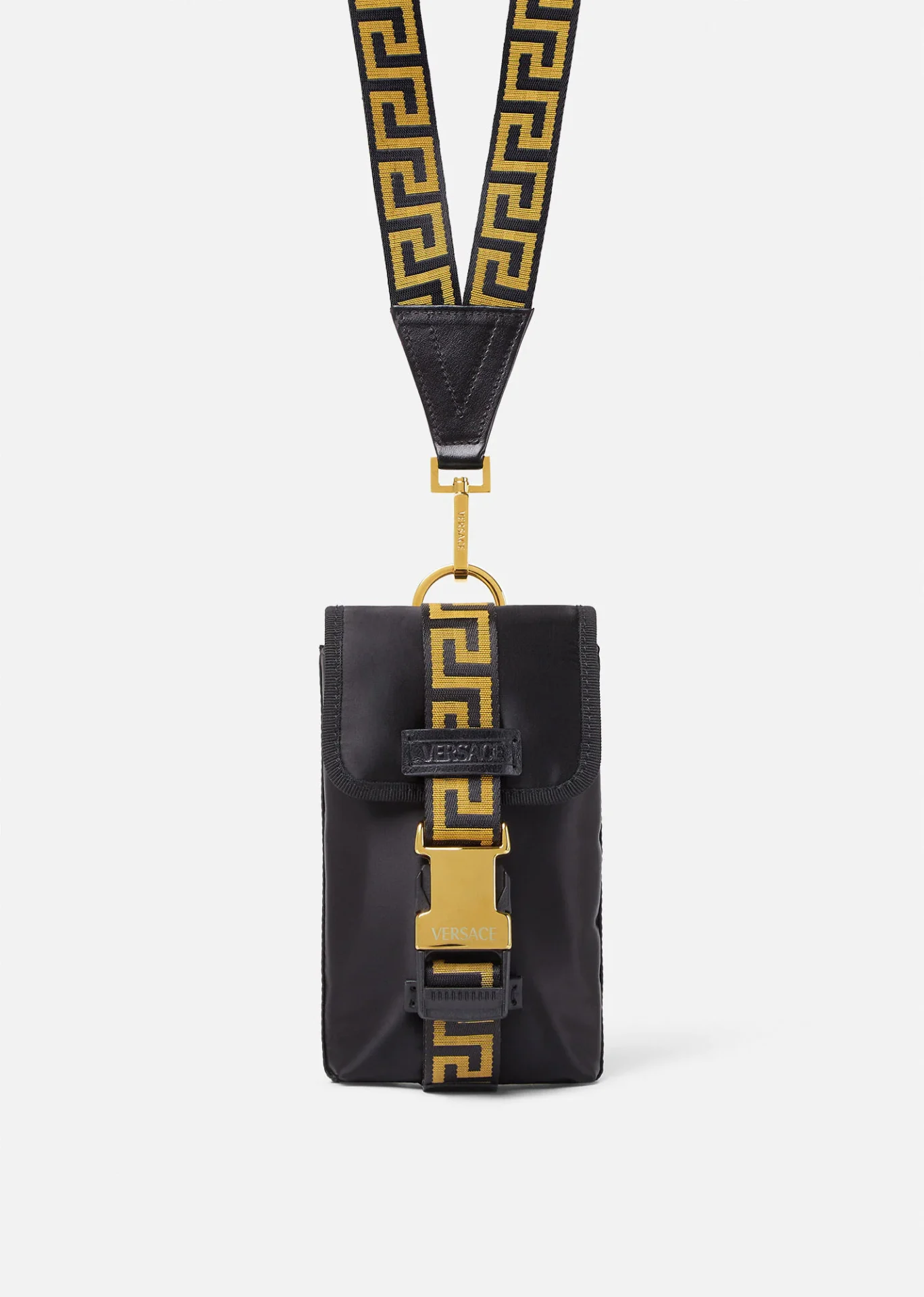 A black and gold bag with a strap.