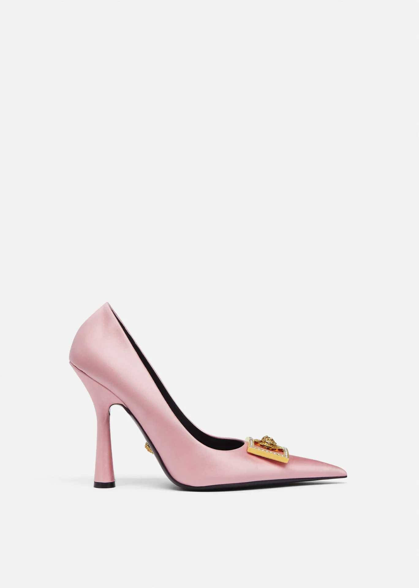 A pink pump with a gold lock on the side.