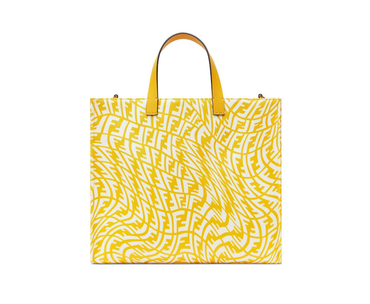 A yellow bag with an animal print on it.