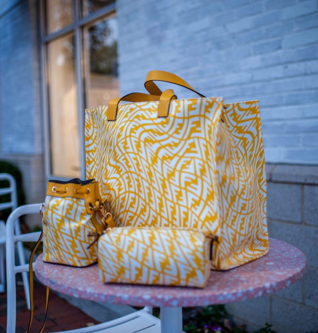 A yellow bag sitting on top of a table.