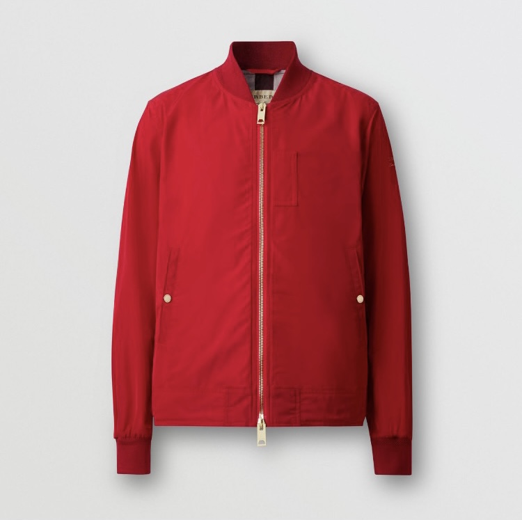 A red jacket is shown on a white background.