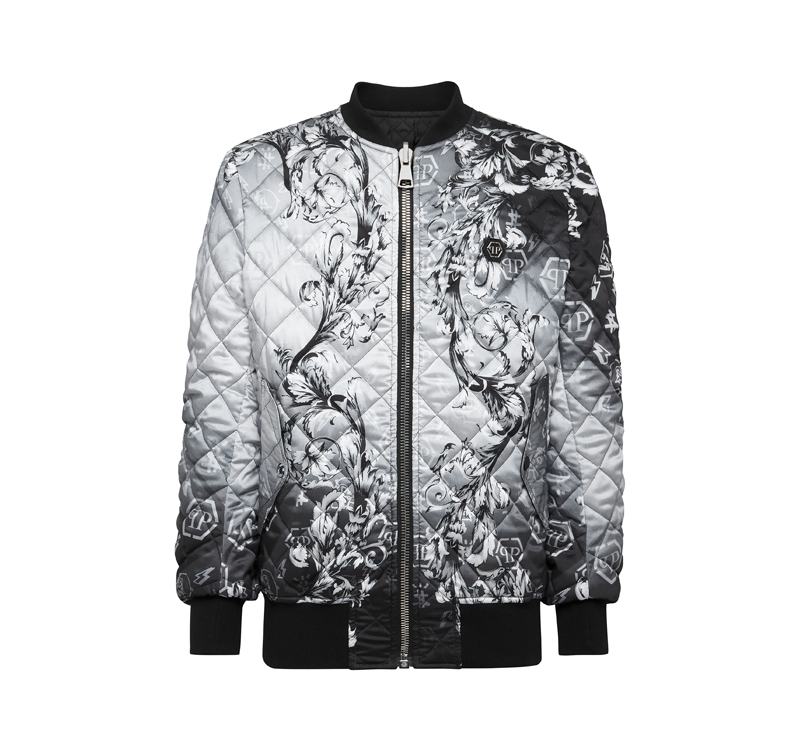 A jacket with an image of a dragon on it.