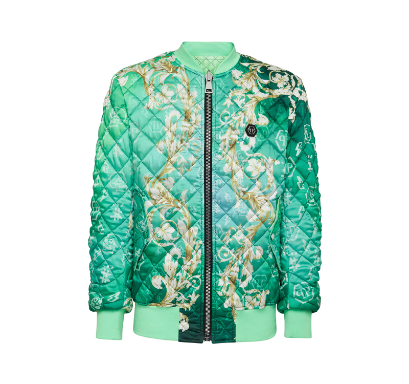 A green jacket with gold and black print.