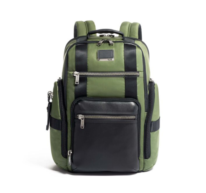 A green backpack with black accents on it.