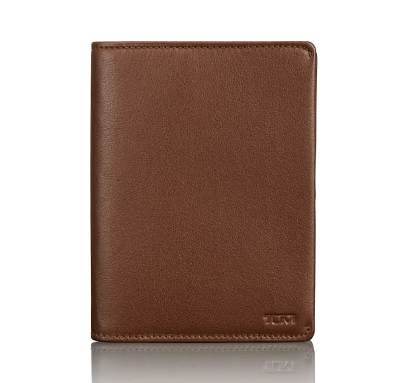 A brown leather wallet sitting on top of a white table.