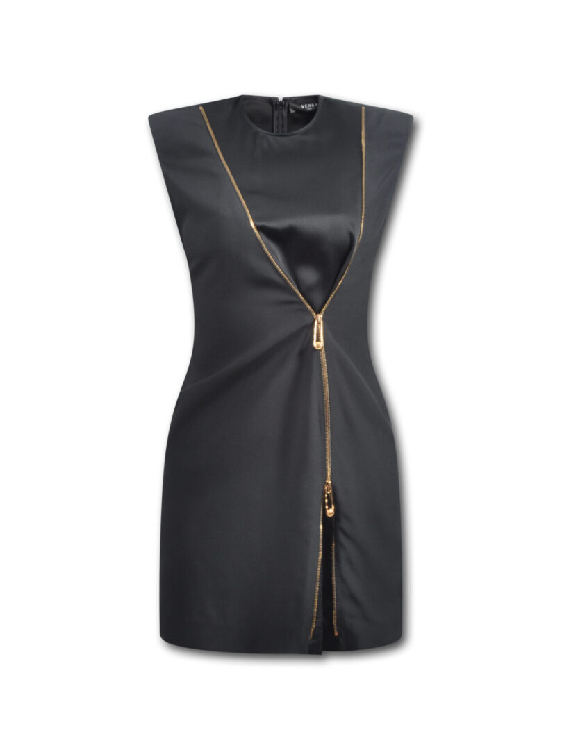 A black dress with gold zippers on it.