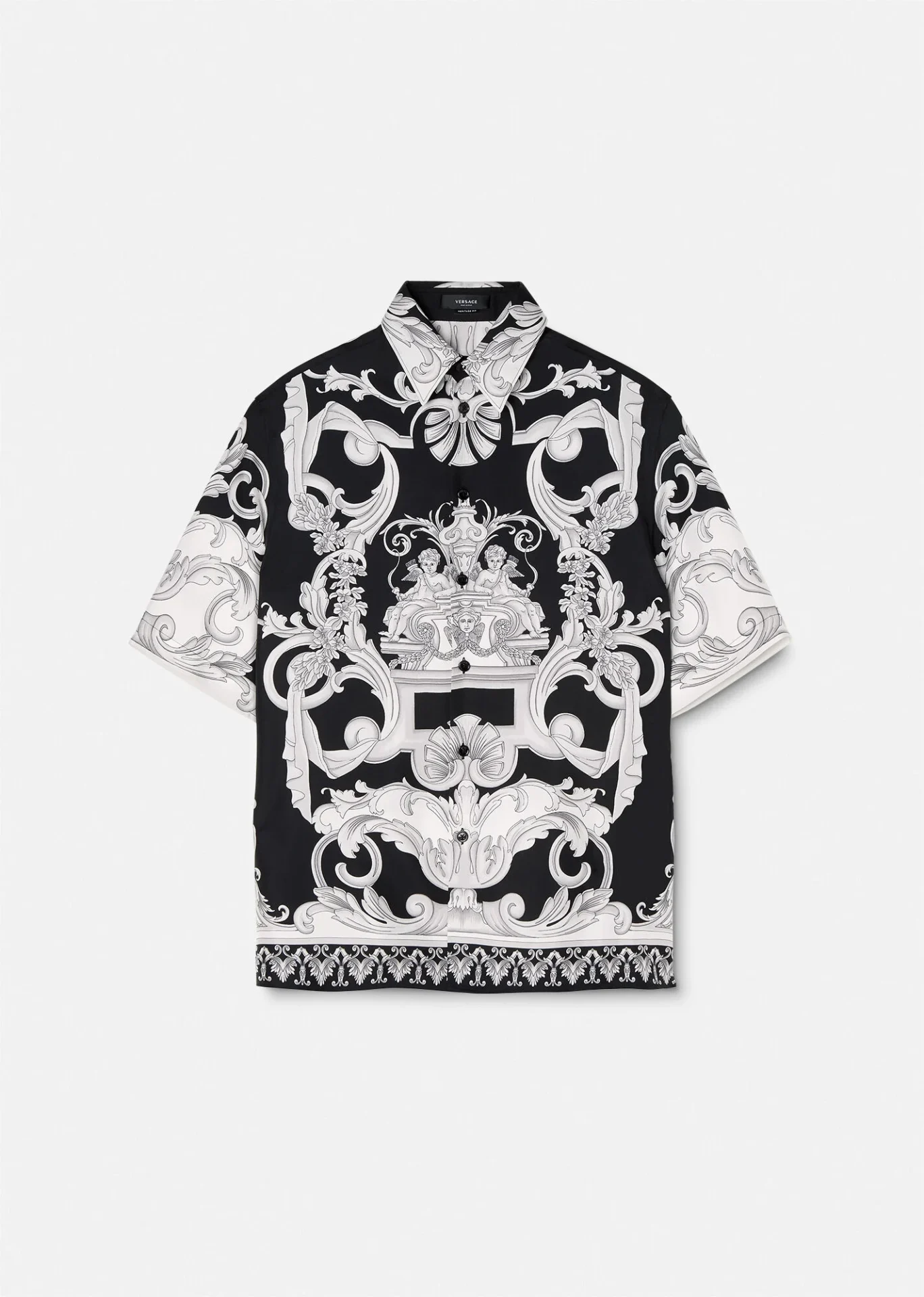 A black and white shirt with an ornate design.