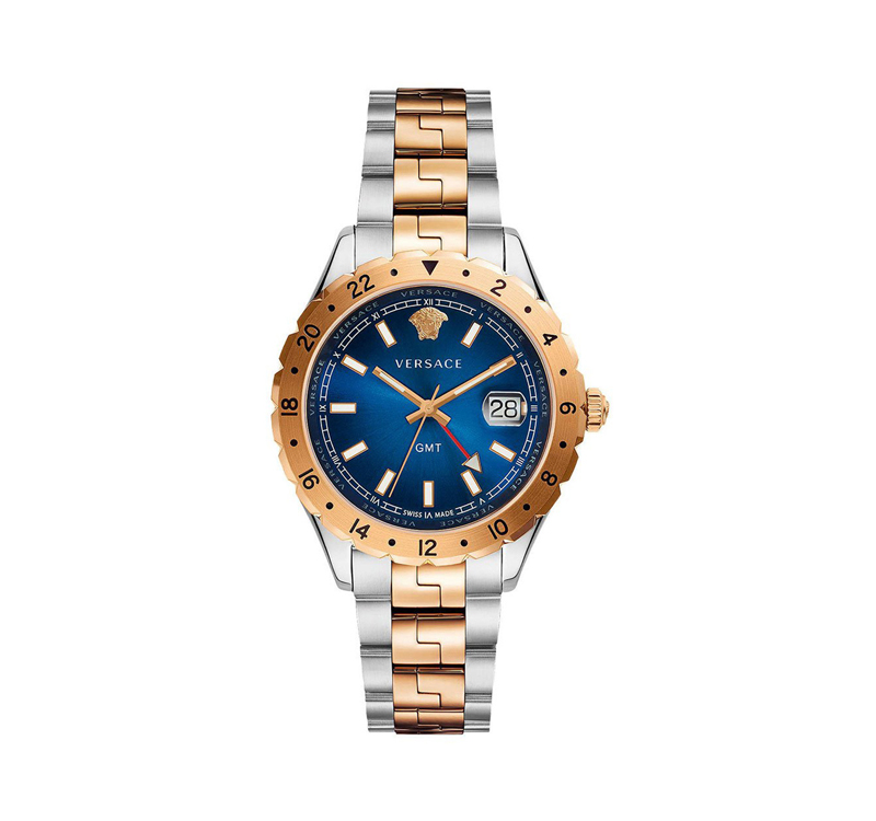 A gold and silver watch with blue face